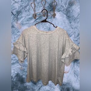 Light grey ruffled short sleeve shirt